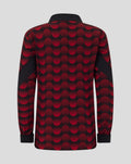 Back view of a junior Feyenoord home matchday jacket with a bold red dot pattern on black fabric