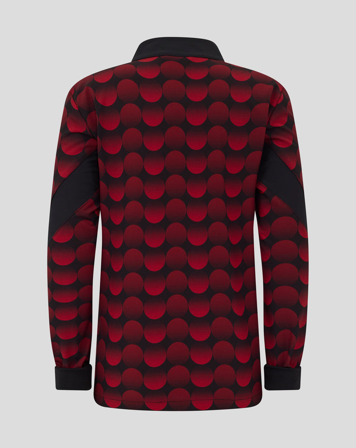 Back view of a junior Feyenoord home matchday jacket with a bold red dot pattern on black fabric
