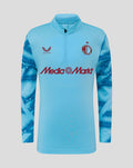 Front view of Feyenoord third Matchday Midlayer Top 2025-2026 junior in light blue with darker blue sleeve print, crest on chest and Media Markt branding