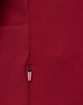 Front view of red Feyenoord Travel Hoody with zipper, Castore logo on left chest and club crest on right.