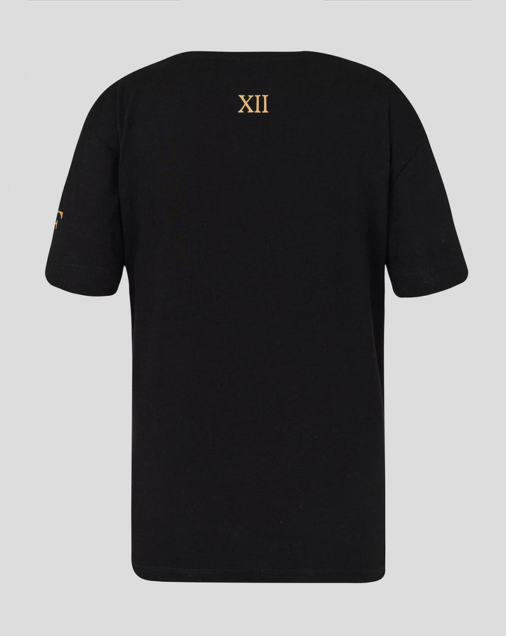 Back view of a black junior T-shirt with a gold XII roman numeral on the upper back.