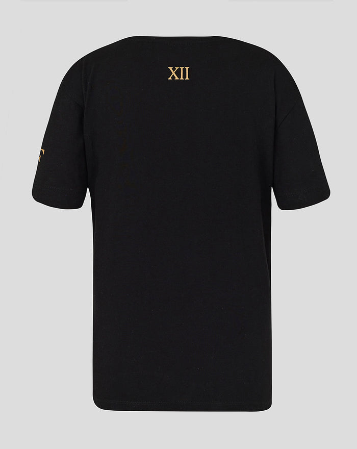 Back view of a black junior T-shirt with a gold XII roman numeral on the upper back.
