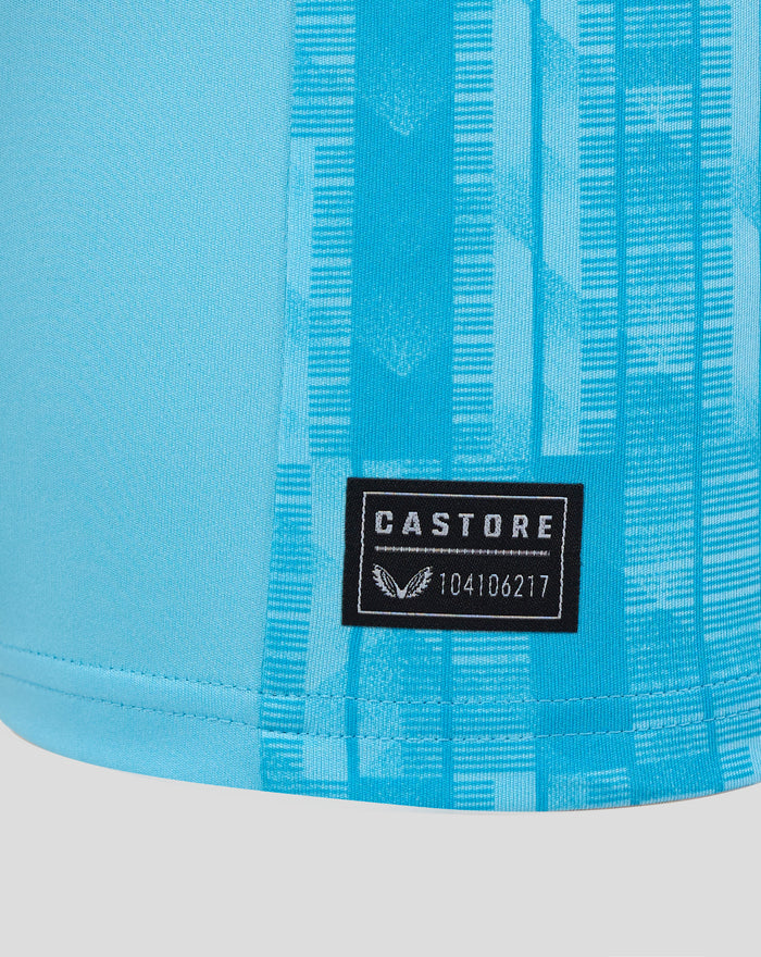 Close up of the Feyenoord keeper home shirt fabric highlighting blue vertical pattern and a Castore patch