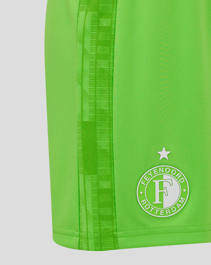 Close up of neon green keeper shorts showing side tape and star accent
