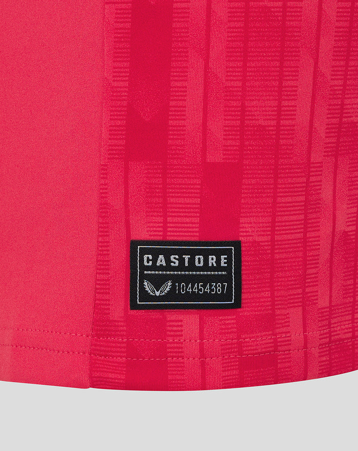 Close up of red fabric on Feyenoord keeper third shirt with Castore label patch