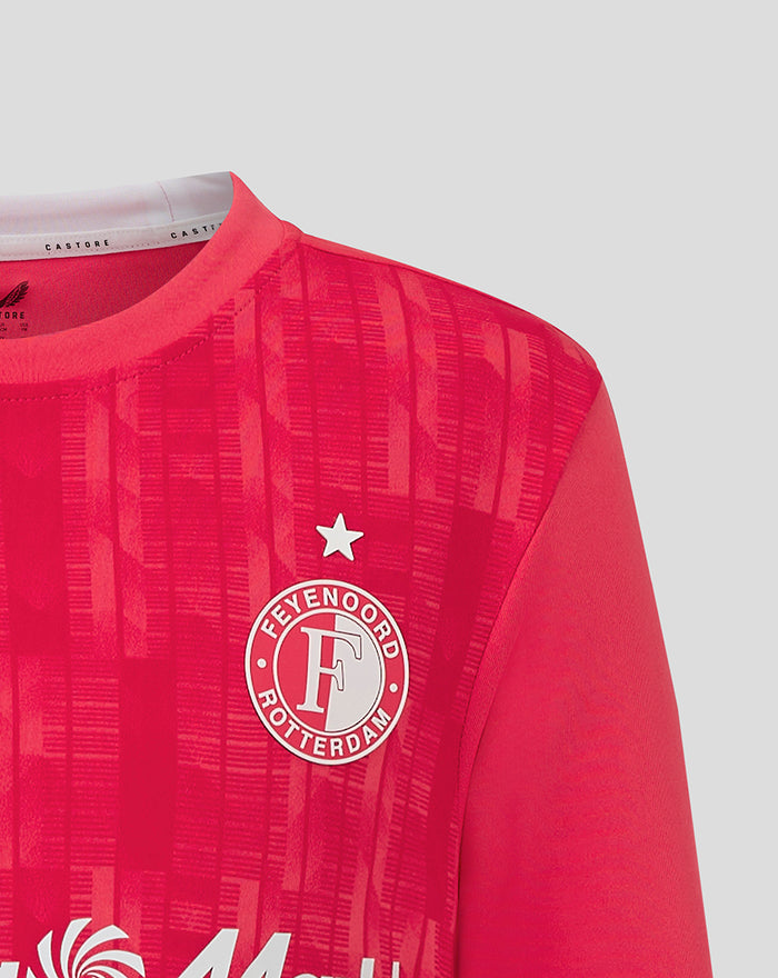 Close-up of upper chest on the keeper shirt showing the Feyenoord crest on the left and Castore logo on the right