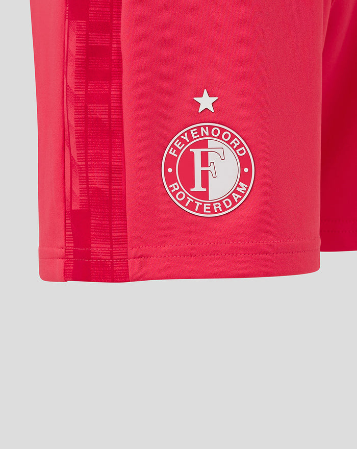 Close-up of the red Feyenoord keeper shorts showing the badge with a star above.