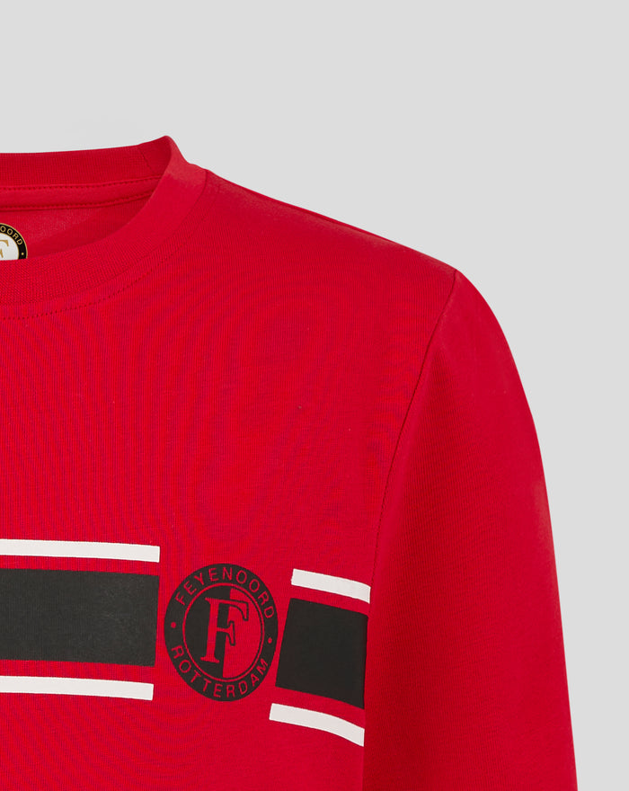 Close up of red Feyenoord Classic Junior T shirt with graphic patch and white stripe design