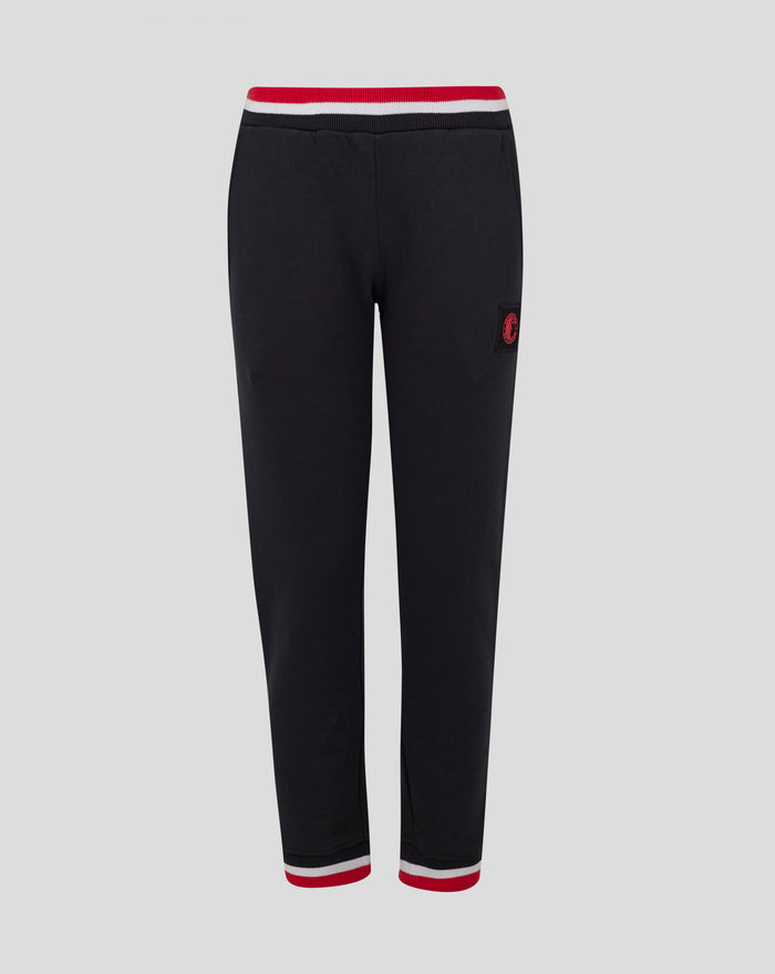 Feyenoord junior black joggers with red white striped waistband and small club crest patch.