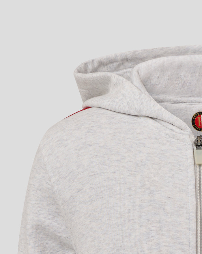 Gray hoodie sleeve with red white and black stripe and a front pocket detail.