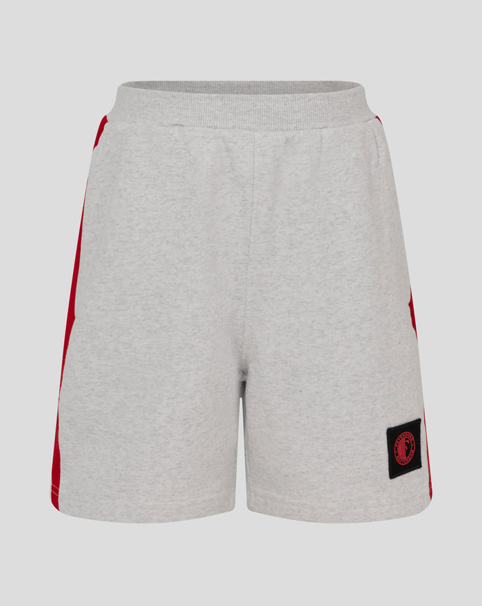 Grey junior shorts with red side piping and a Feyenoord badge patch on the leg