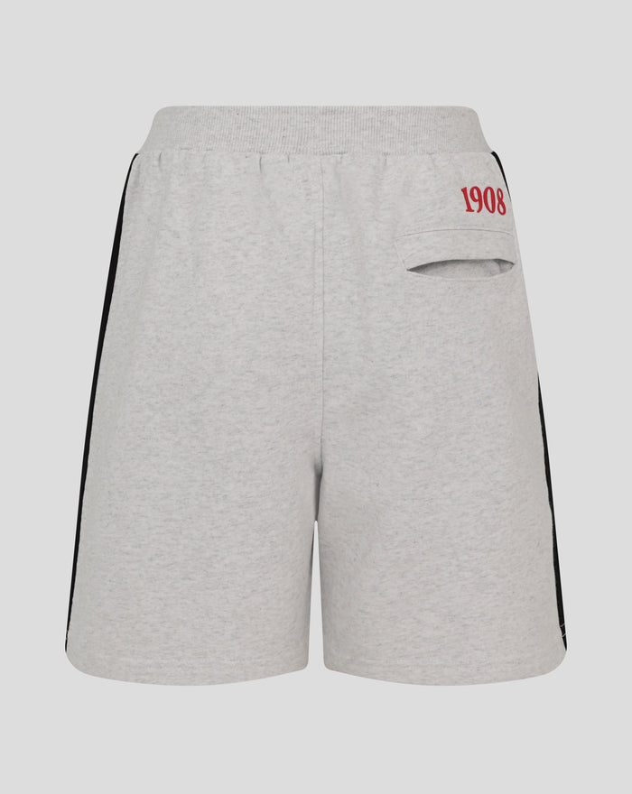 Back view of light grey Feyenoord junior shorts with elastic waistband and red 1908 on the right pocket