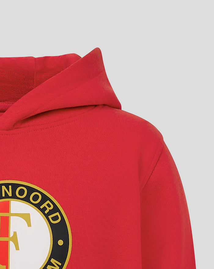 Close-up of hood and shoulder on red FEYENOORD Core Hoody junior with partial circular crest on chest.