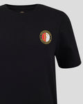 Close-up of the round Feyenoord crest on a black Junior T-shirt.