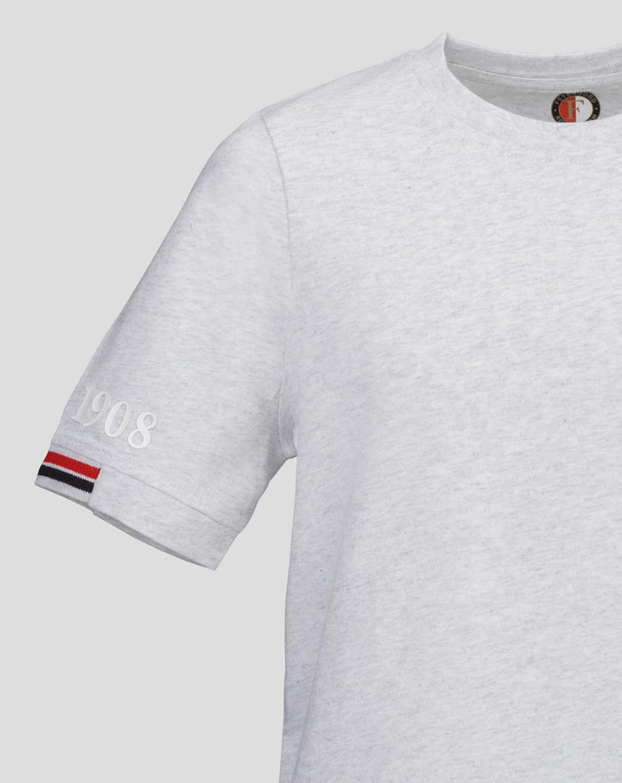 Close-up of gray Feyenoord Junior T shirt sleeve with white 1908 embroidery and red white black striped cuff