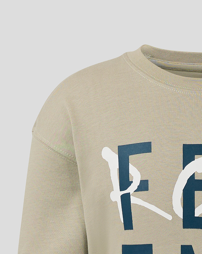Shoulder and upper chest close up of beige Feyenoord Contemporary Junior T shirt with bold front graphic