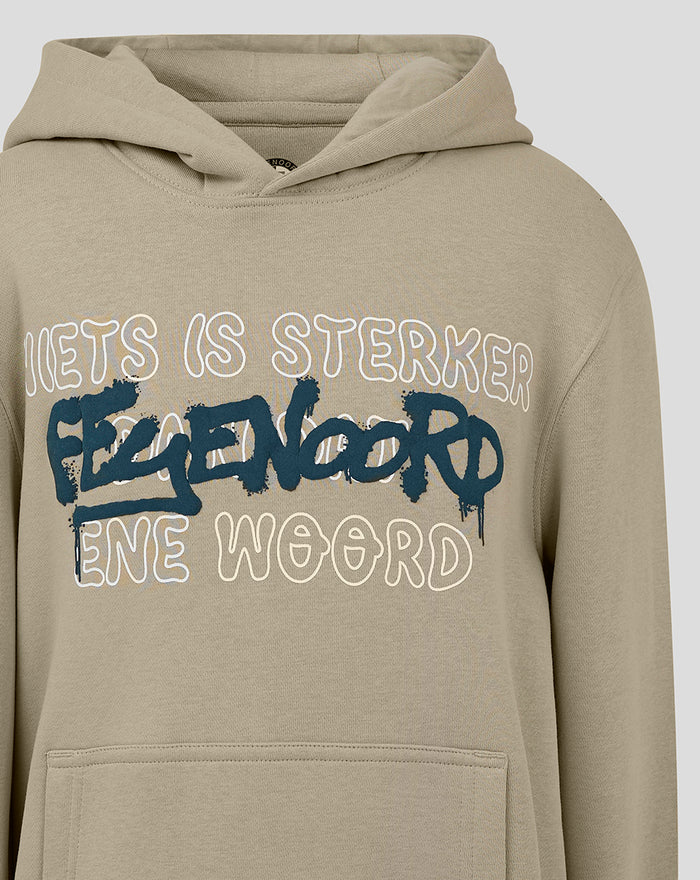 Close up of taupe grey Feyenoord contemporary junior hoodie showing the chest graffiti print with bold FEYENOORD letters.