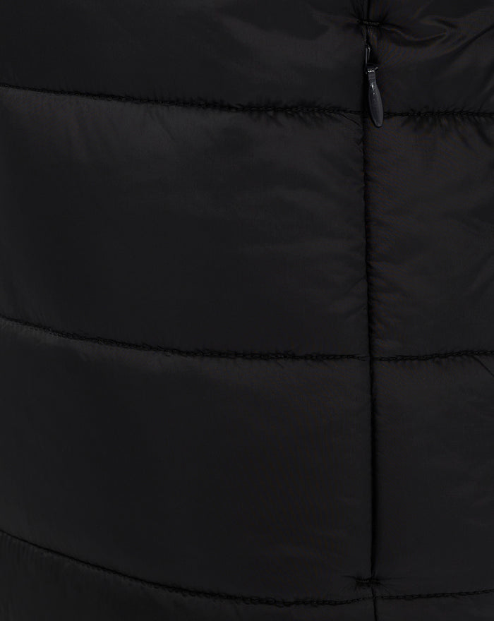 Close-up of black FEYENOORD Core junior puffer jacket showing quilted panels and zipper pull