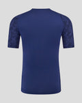 Back view of navy Feyenoord training T shirt with patterned sleeves and contrasting side panels.