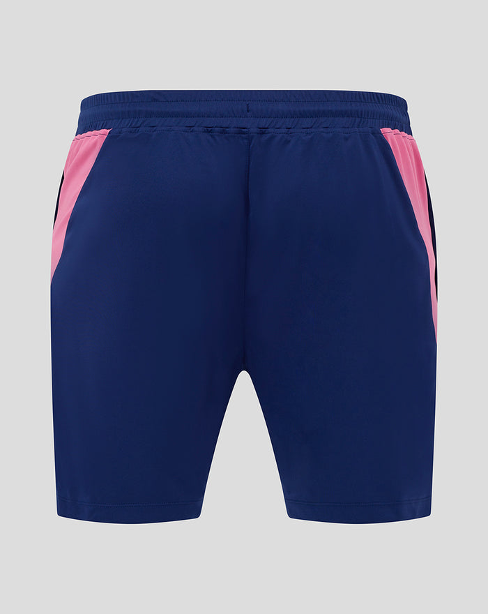 Back view of navy shorts with pink side panels and a pink Castore logo on the right leg.