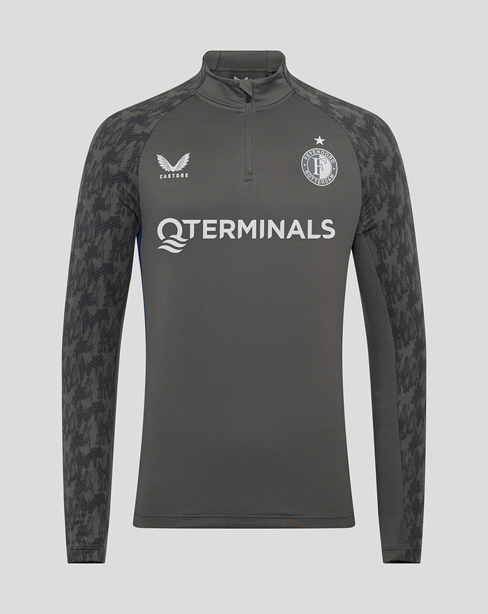 Front view of a dark gray Feyenoord Castore training midlayer top with quarter zip patterned sleeves and chest logos.