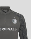 Dark gray Feyenoord training midlayer top with Castore logo on the right chest and Feyenoord crest on the left, TERMINALS across the front.