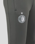 Close-up of the Feyenoord crest on the thigh of the gray training pants.