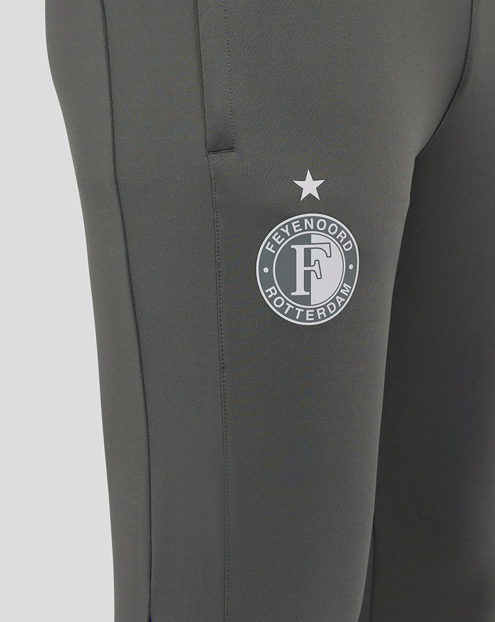 Close-up of the Feyenoord crest on the thigh of the gray training pants.