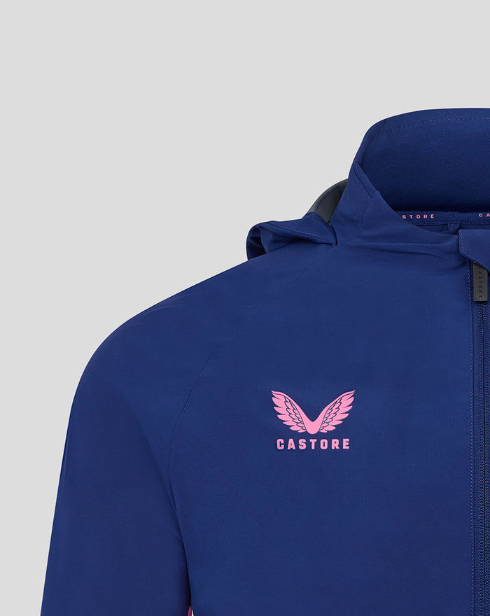 Blue men's training jacket with pink Castore logo on the chest