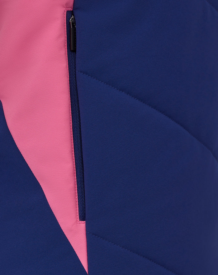 Close-up of blue Feyenoord training gilet showing a pink side panel and zipper