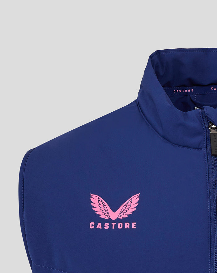 Blue Feyenoord players training gilet with pink wing logo on chest