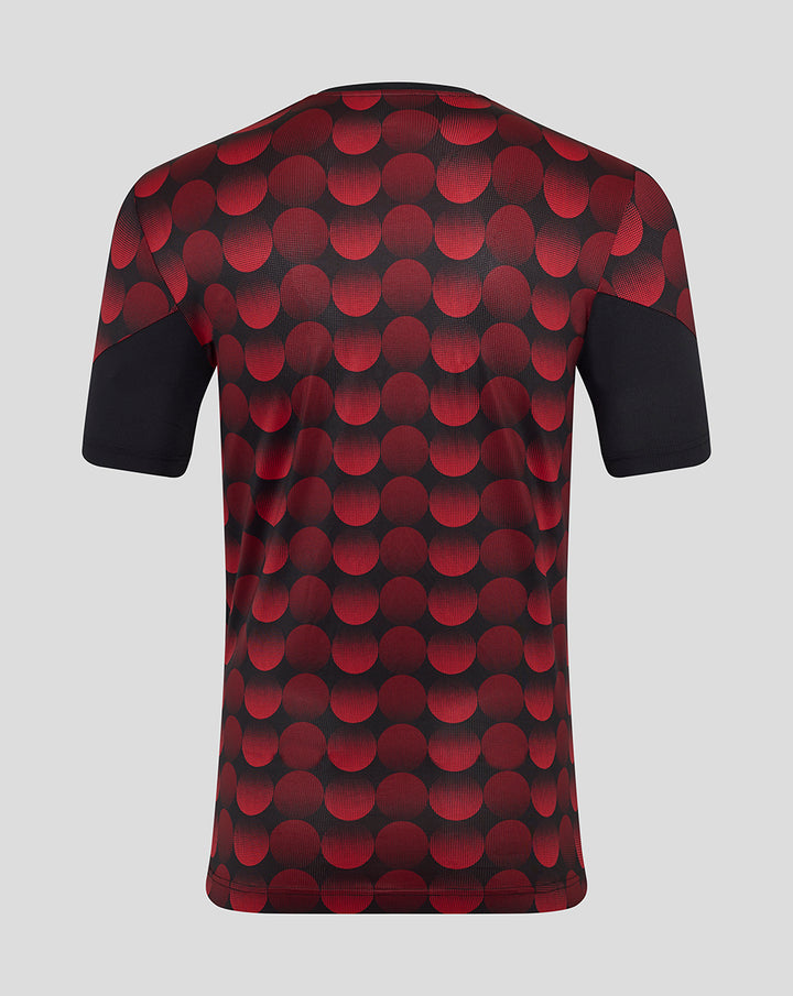 Back view of Feyenoord Thuis Matchday T-shirt with a bold red dot pattern on dark fabric