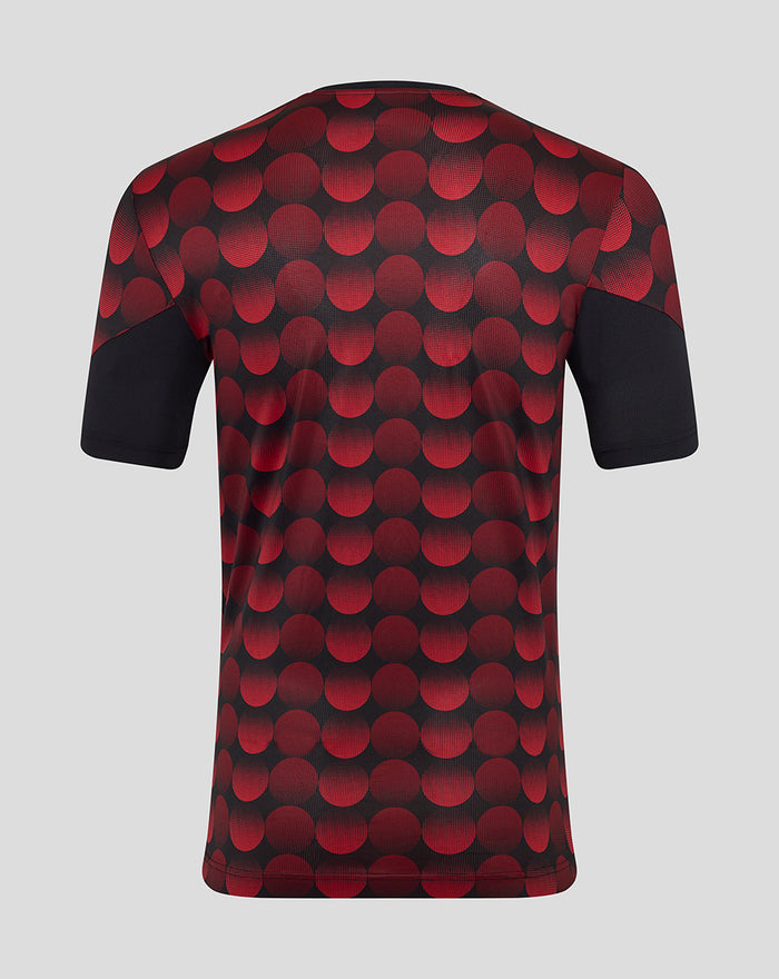 Back view of Feyenoord Thuis Matchday T-shirt with a bold red dot pattern on dark fabric