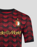 Close-up of Feyenoord Thuis Matchday T-shirt showing the red dot print and CASTORE neck trim