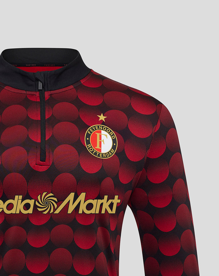 Front view of Feyenoord home Matchday Midlayer Top 2025-2026 for men with red circular pattern, crest on chest and gold Media Markt branding