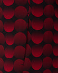 Close up of red halftone dot pattern on black fabric, part of the Feyenoord Thuis Matchday Jacket design.