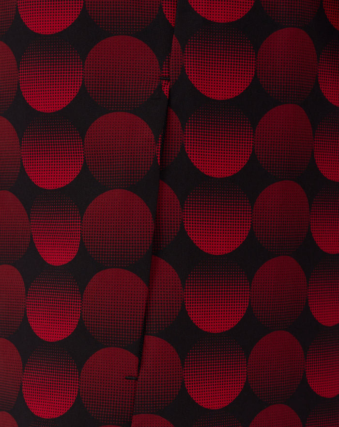 Close up of red halftone dot pattern on black fabric, part of the Feyenoord Thuis Matchday Jacket design.