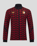 Feyenoord home matchday jacket for men with red and black polka dot pattern full zip gold Castore logo and club crest