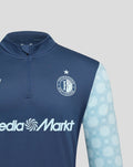 Close-up of dark blue Feyenoord Uit Matchday Midlayer Top with star above crest and light blue patterned sleeve and MediaMarkt sponsor.