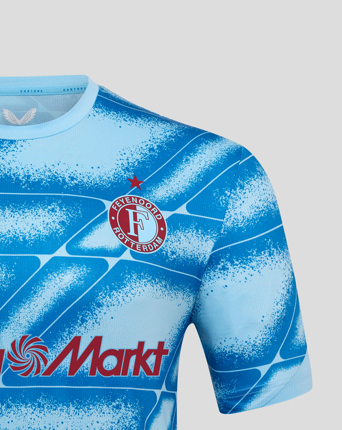 Lower front of the Feyenoord Derde Matchday shirt with bold red MediaMarkt logo over the blue graphic pattern.