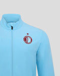 Front close up of a light blue Feyenoord third matchday jacket for men showing the Castore logo on the chest.