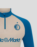 Front close-up of the stadium midlayer top showing a blue collar zip and the Feyenoord crest on beige fabric