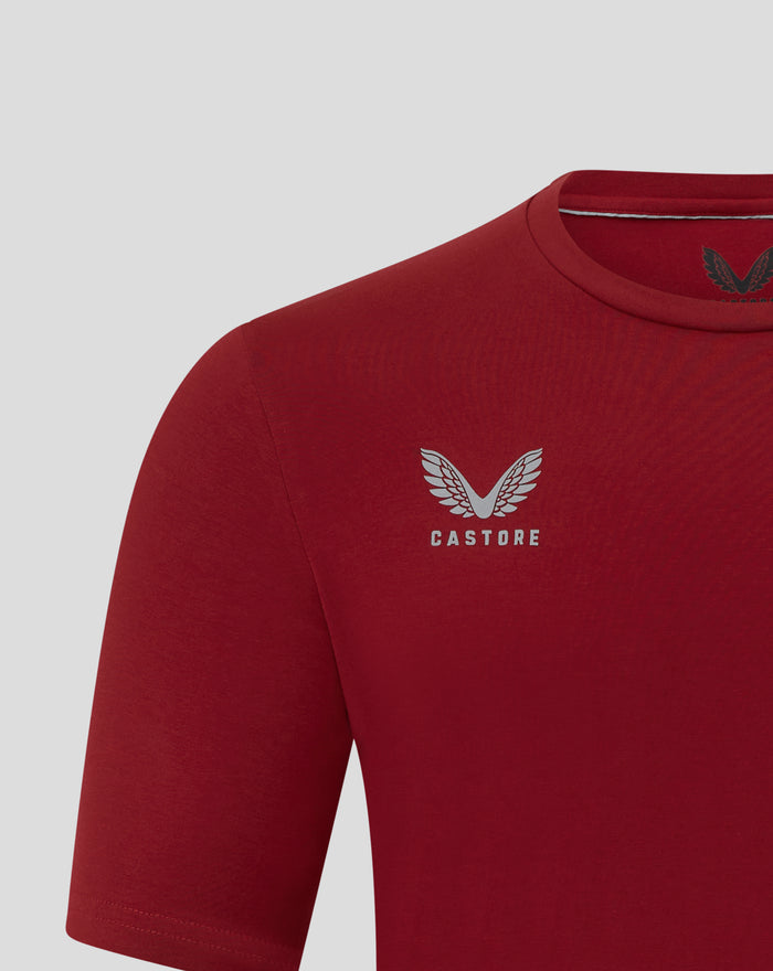 Red shirt chest featuring the Castore logo with a wing motif.