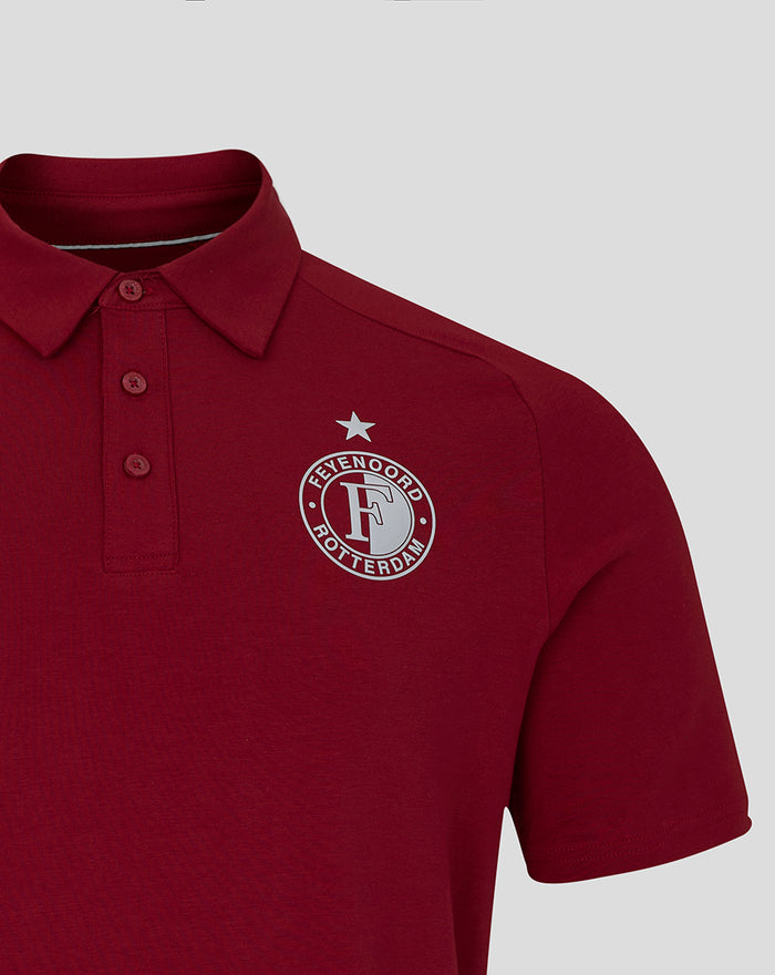 Close-up of a deep red polo with the Feyenoord club crest on the left chest and a star above.