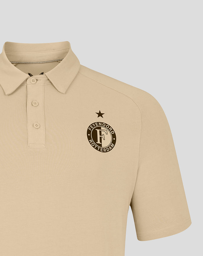 Close up of beige Feyenoord Travel Polo front with club crest and star above the badge