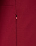 Close-up of maroon Feyenoord Travel Hoody zipper on the front panel.