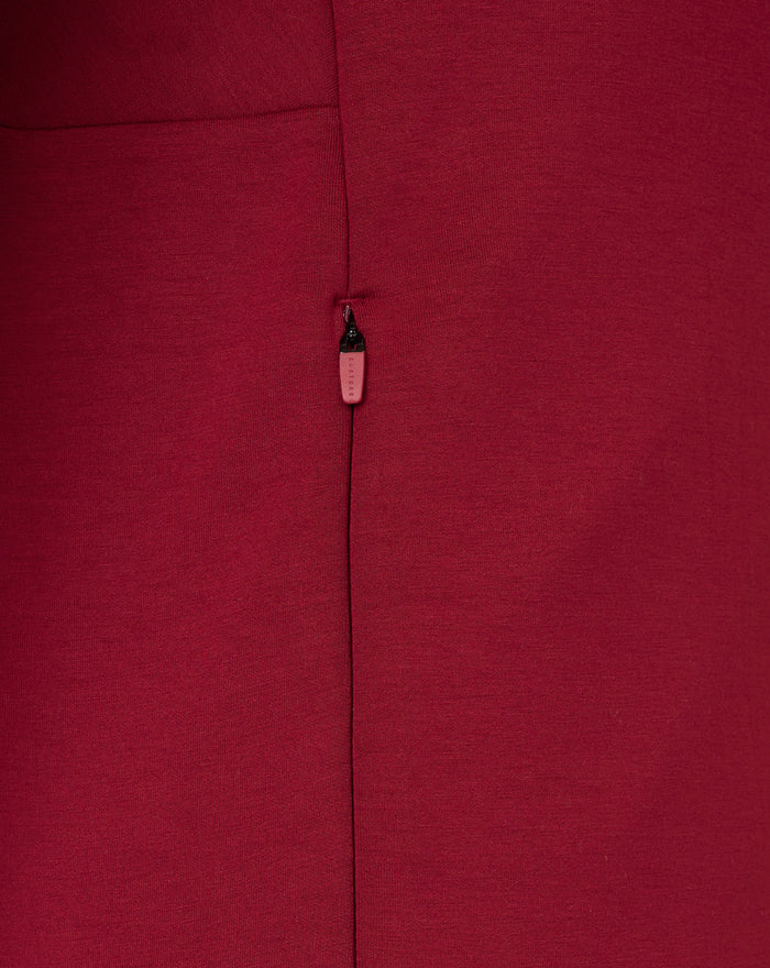 Close-up of maroon Feyenoord Travel Hoody zipper on the front panel.