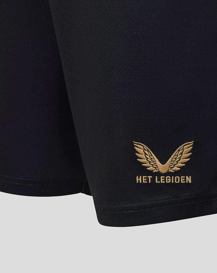 Close-up of black football shorts hem with gold Het Legioen wing embroidery