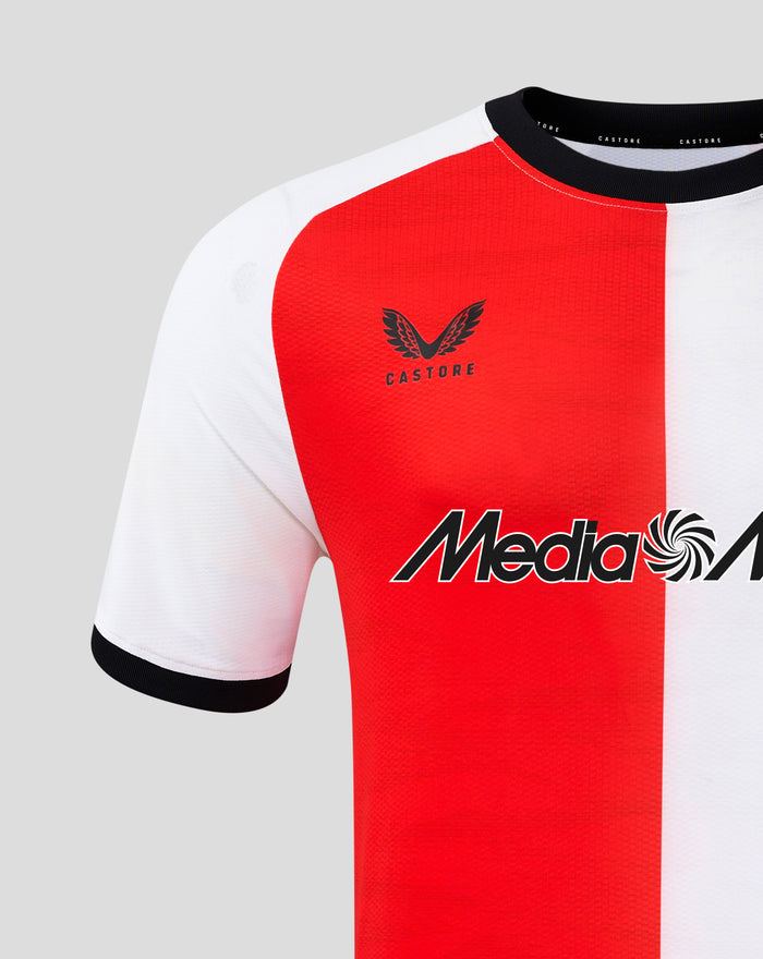 Front close up of the Feyenoord home shirt with bold red and white panels and sponsor logo on the chest