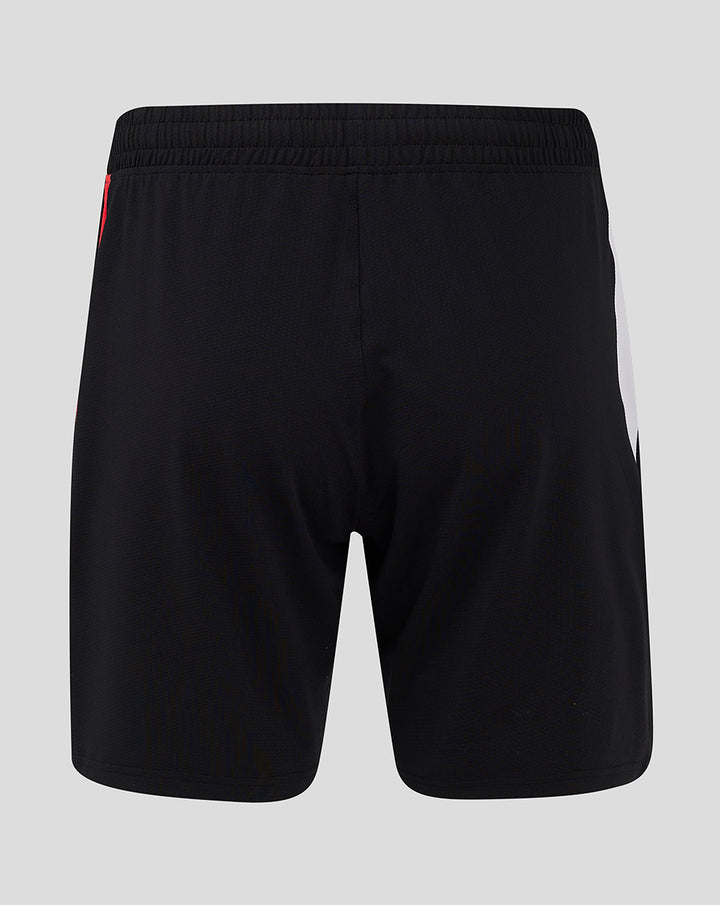 Back view of black Feyenoord Pro home shorts for men with waistband and side panel accented by a red stripe